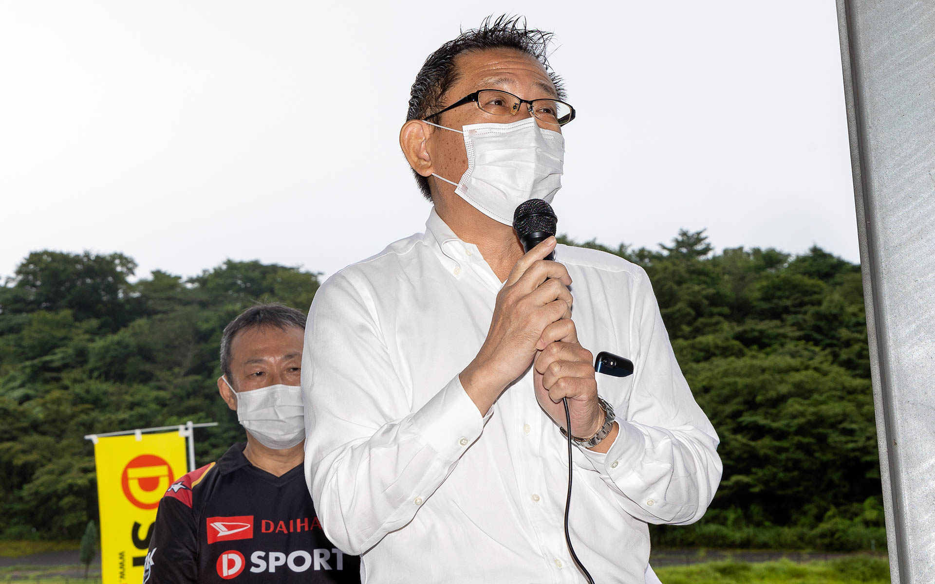 D-SPORT＆DAIHATSU Challenge CUP 2022の開会式であいさつしたダイハツ工業株式会社 コーポレート統括本部 統括部長（LYU・ブランド、広報渉外担当）東京支社長の井出慶太氏