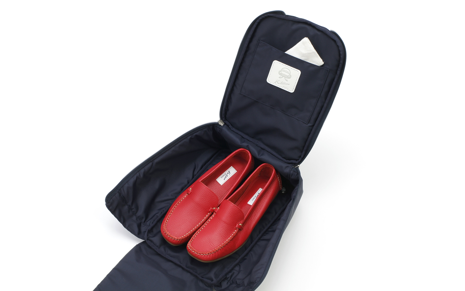 横浜元町キタムラとOKISHUのコラボアイテム第1弾として製作されたシューズケース