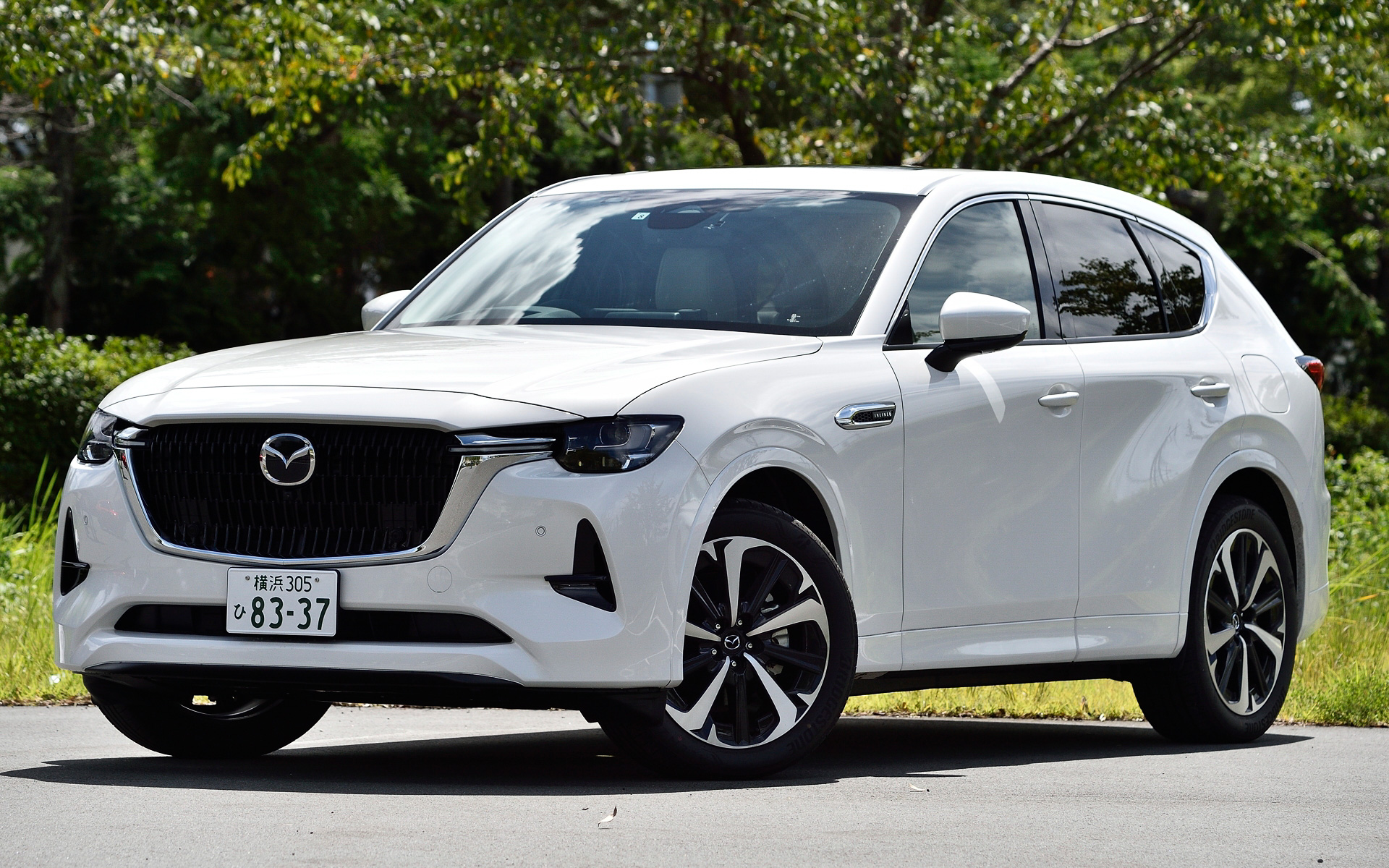 試乗したのは「XD-HYBRID Premium Modern」で、ボディカラーはロジウムホワイトプレミアムメタリック。直列6気筒3.3リッターディーゼル＋モーターの48Vマイルドハイブリッド仕様「e-SKYACTIV D（M Hybrid Boost）」搭載モデル