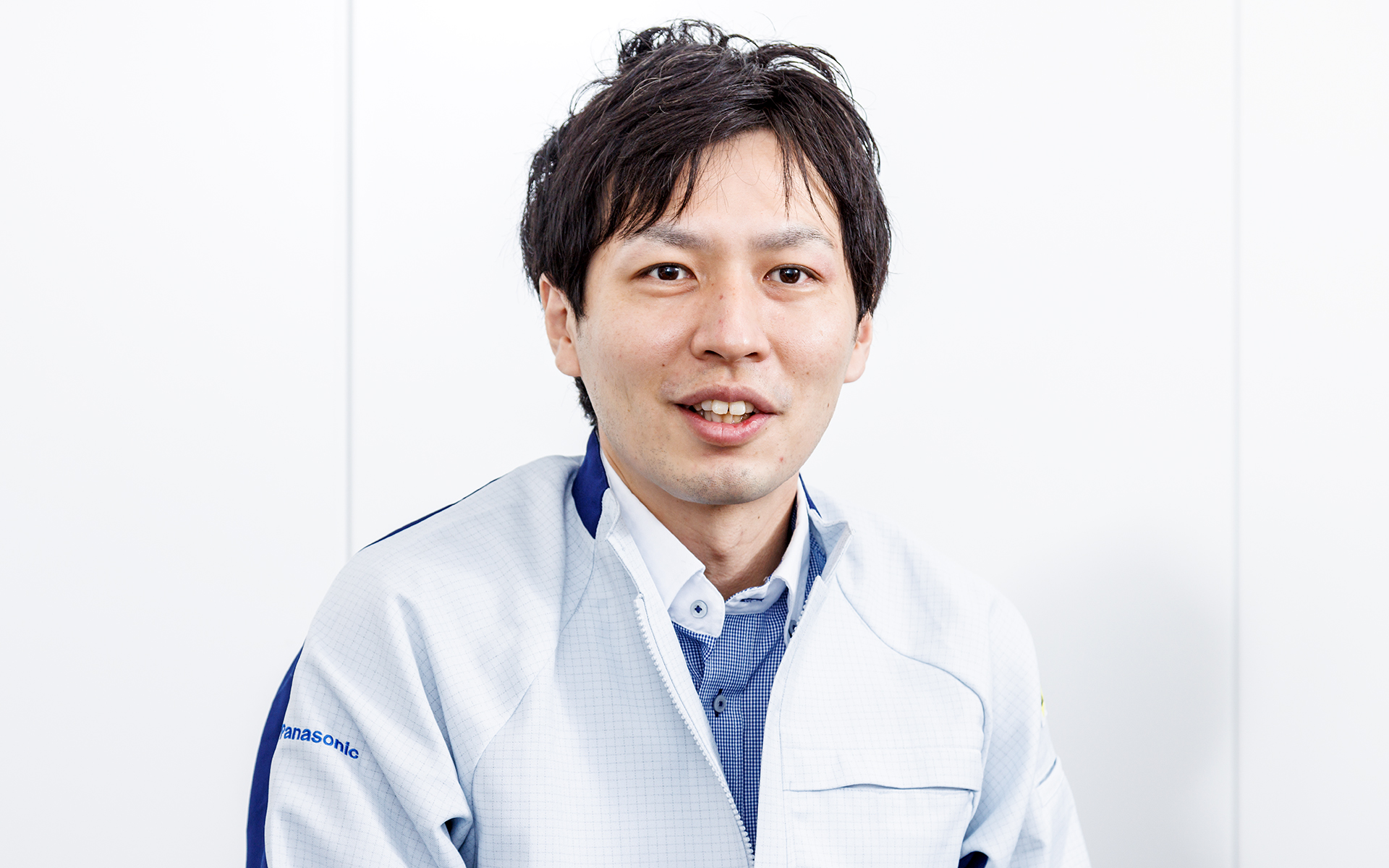 レコーダーの映像をスマホで見るか、ストラーダで見るかの違いを説明するパナソニック オートモーティブシステムズ（株） インフォテインメントシステムズ事業部の北野裕介氏