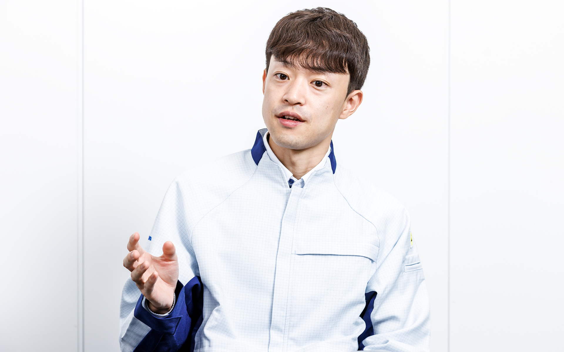 ストラーダの詳細な仕様について説明するパナソニック オートモーティブシステムズ（株） インフォテインメントシステムズ事業部の菊池裕太氏