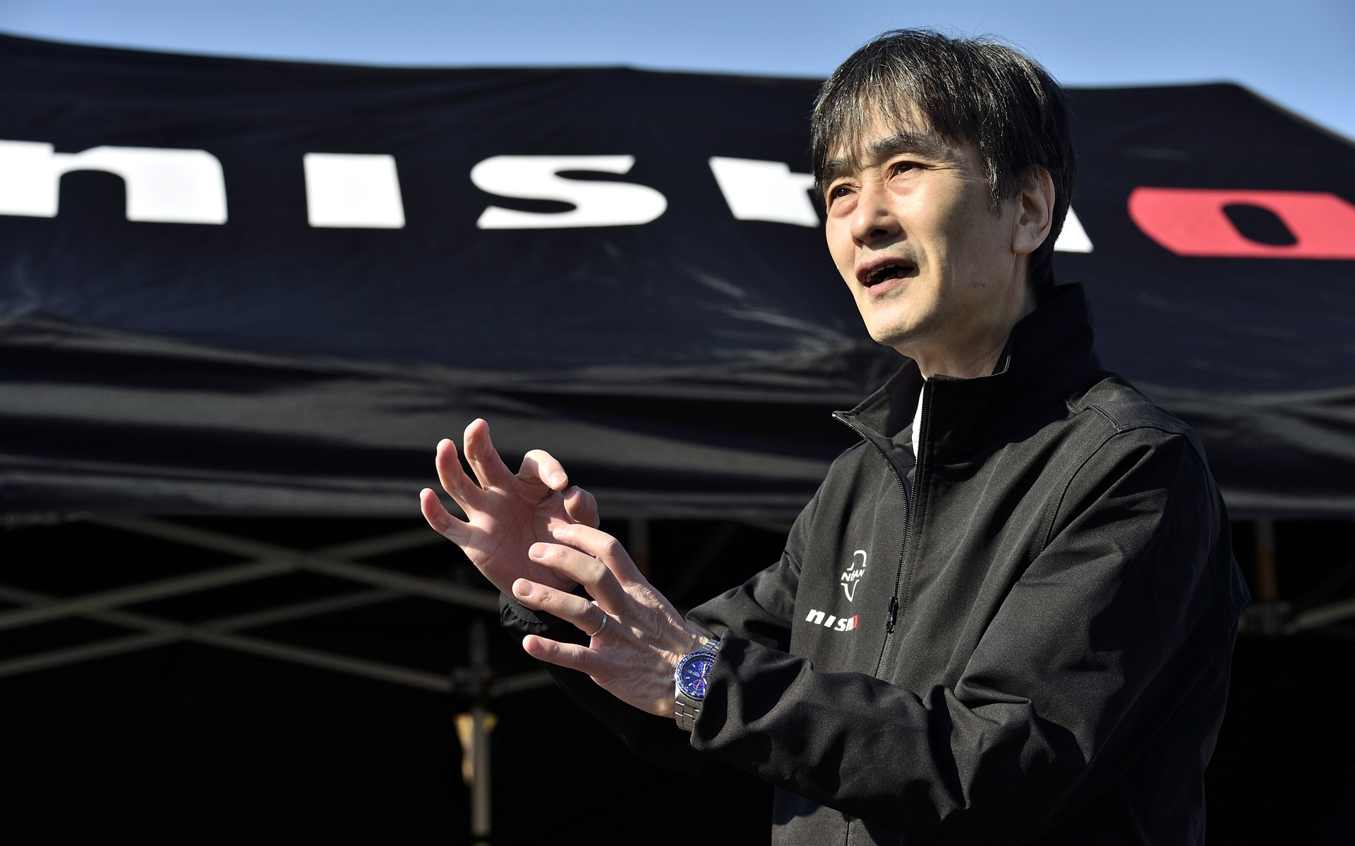 NISMOパーツの解説を行なってくれた日産モータースポーツ＆カスタマイズ株式会社（NMC） ニスモ事業所 モータースポーツ・マーケティング＆セールス部 企画・営業グループ 主管 碓氷公樹氏