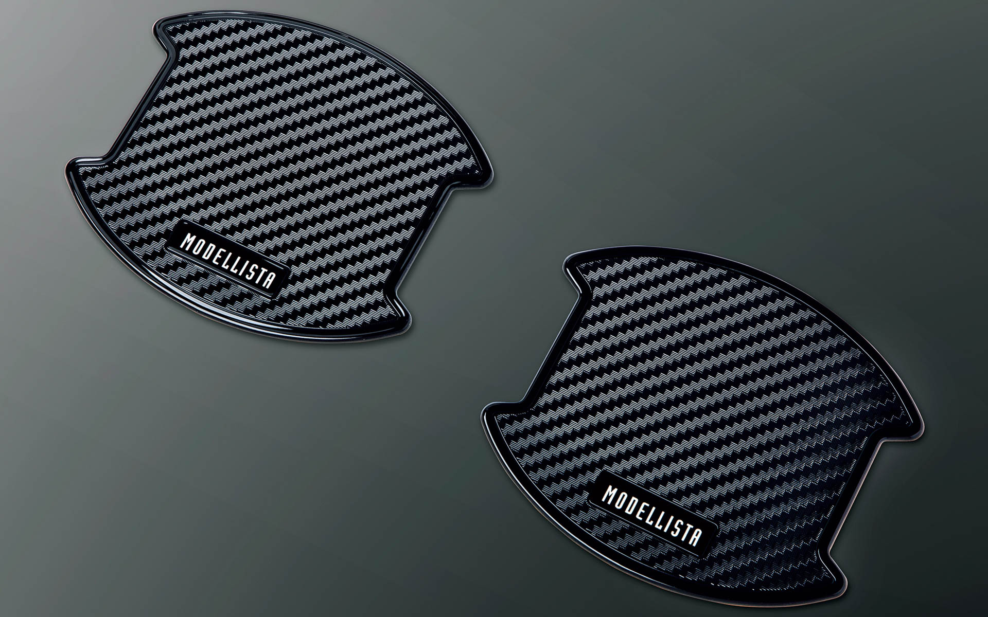 ドアハンドルプロテクター ブラック（6600円/台、3300円/1セット［2枚入り］）