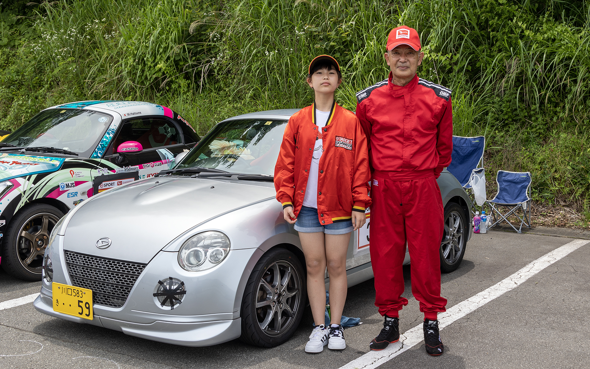 お孫さんと一緒に来ていた「mani4316」さん。現在は引退しているが以前はトヨタにてF1を含むモータースポーツ用のエンジン開発に携わっていたそうだ。現役時代は車両製作に徹していたので走ることはなかったそうだが、引退後にコペンを手に入れたことで「走る側になってみた」とのこと。走ることも楽しいと語ってくれた