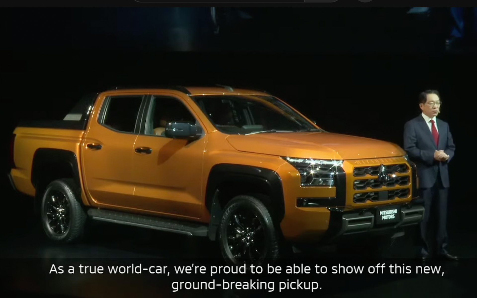 新型トライトン発表会に登壇した三菱自動車工業 代表執行役社長兼最高経営責任者の加藤隆雄氏