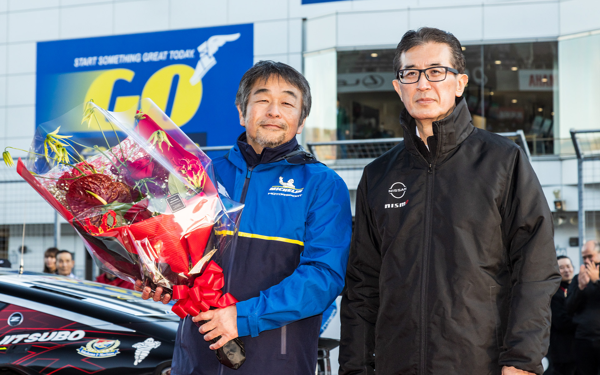 日本ミシュランタイヤ モータースポーツダイレクター 小田島広明氏（写真左）とNMC 片桐CEO