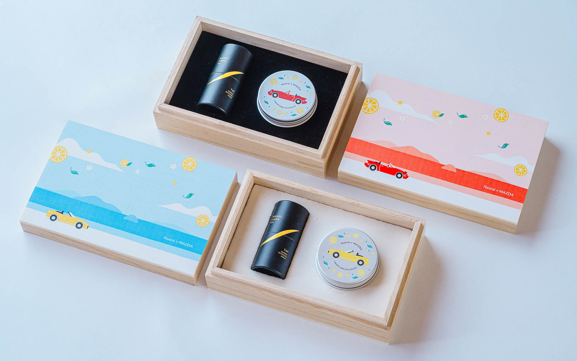 オリジナルデザインの木箱とミカドレモンオイル、アロマストーン缶、モチーフ入りのアロマストーンなどがセットとなる
