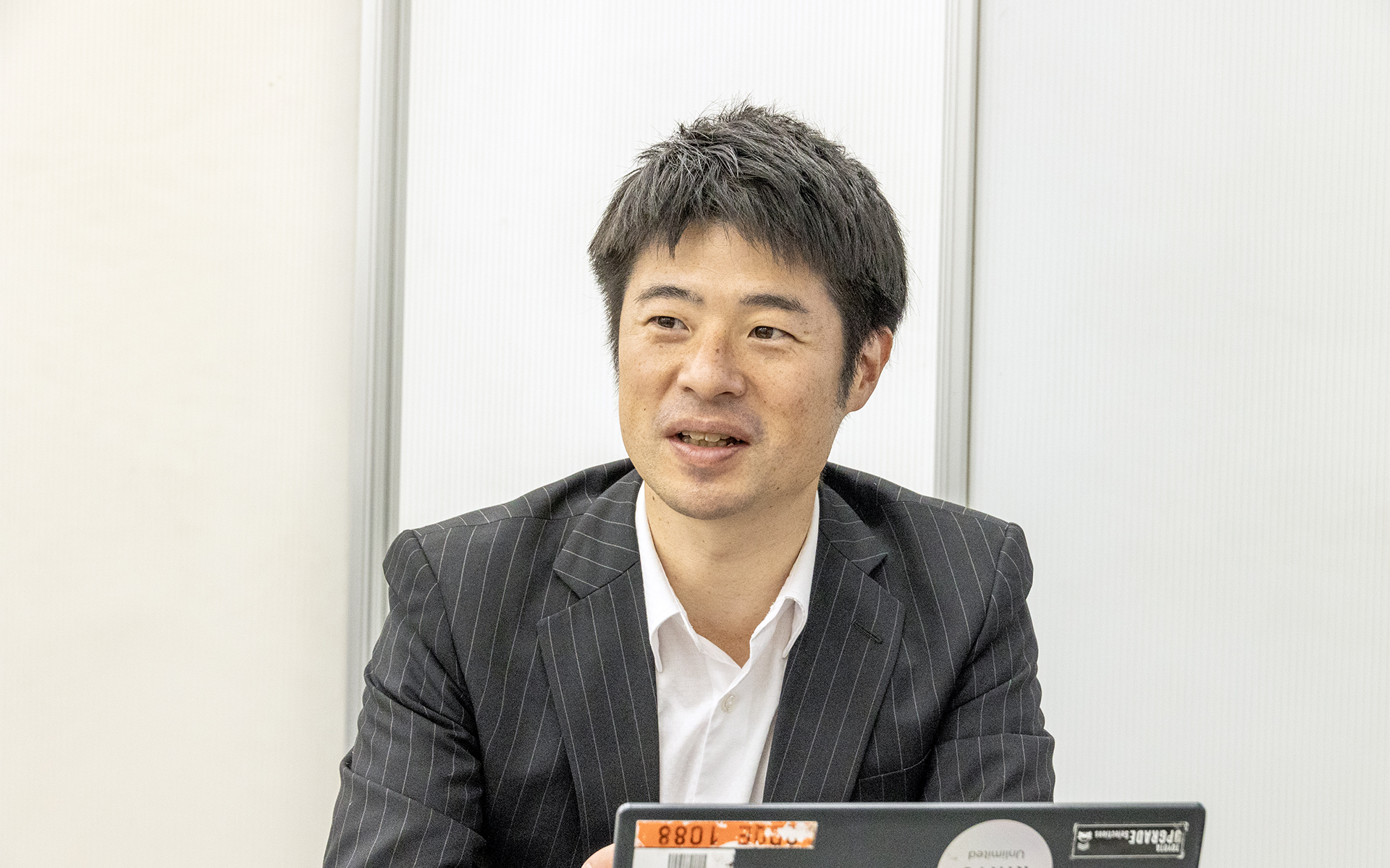 アップグレードの取り組みを担当しているトヨタ自動車株式会社 BR-VC推進室 アップグレード事業グループ 主任 次世代中古車プロジェクトチームの利根優太氏がサービスについての説明を行なった