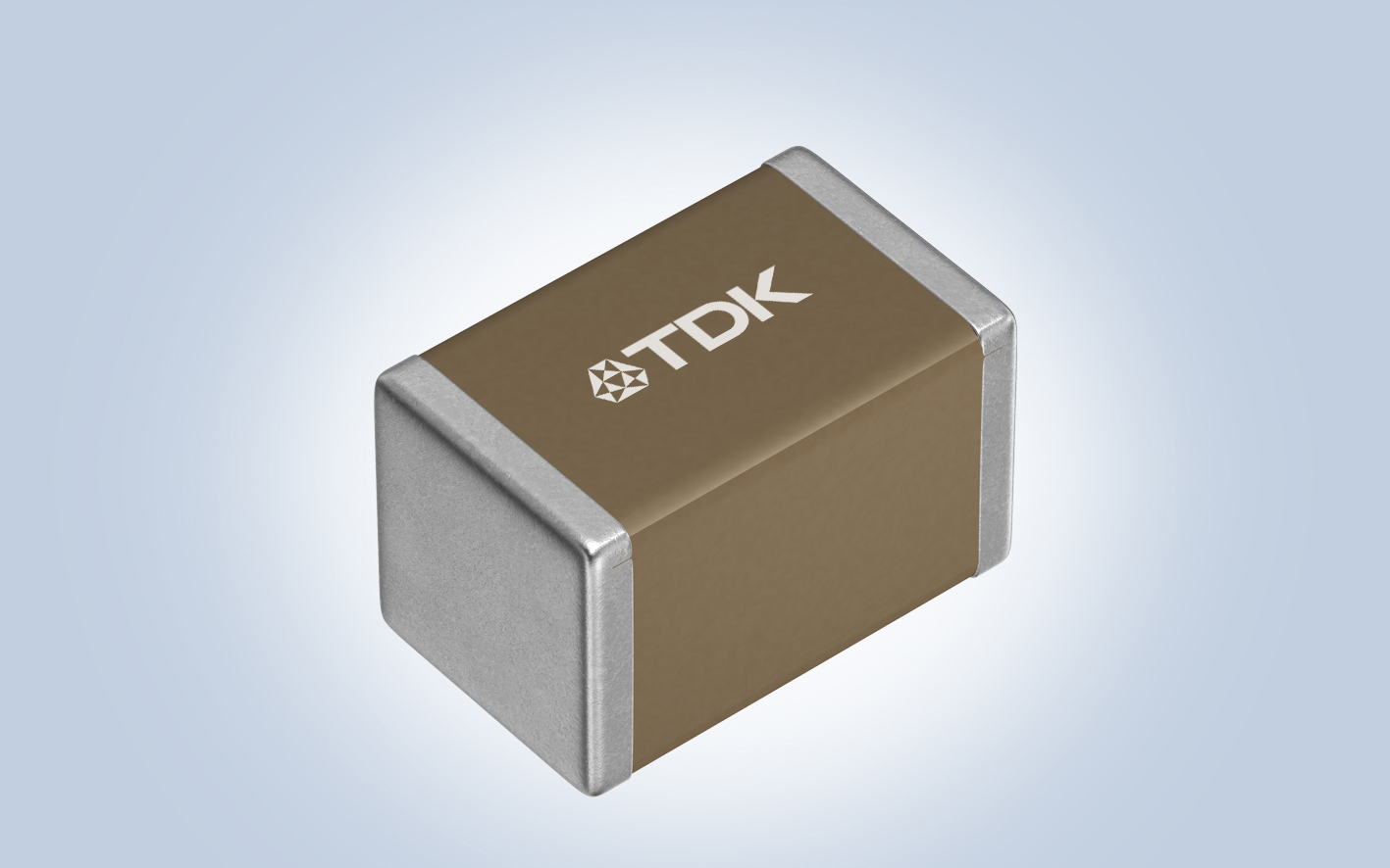 積層セラミックコンデンサの車載用製品「CGA」シリーズとして、業界最大の静電容量となる2012サイズ（2.2μF）と3216サイズ（4.7μF）を開発（実際の製品にTDKのロゴは刻印されない）