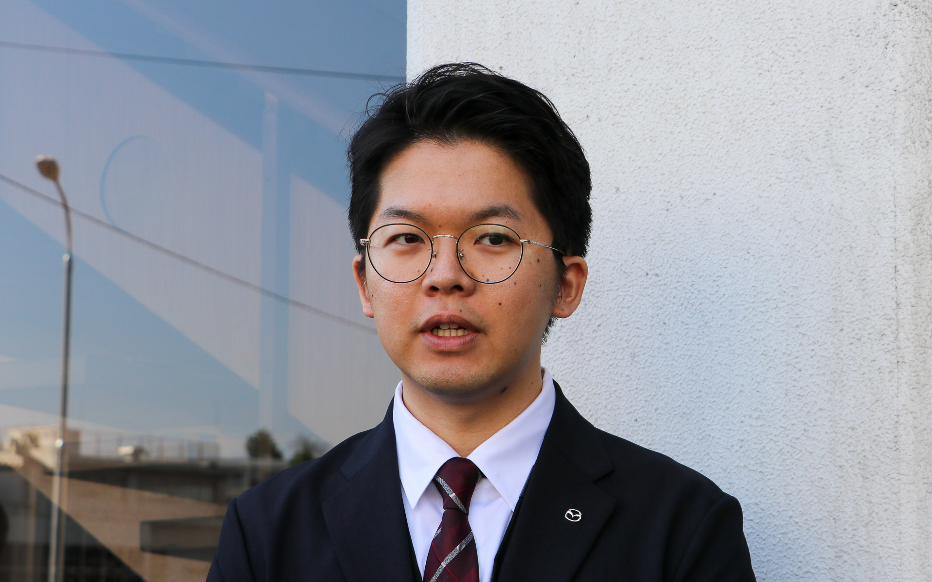 技術系で入社した曽坂光さん。2000年生まれの24歳。マツダ車の中では「CX-5」が好きという