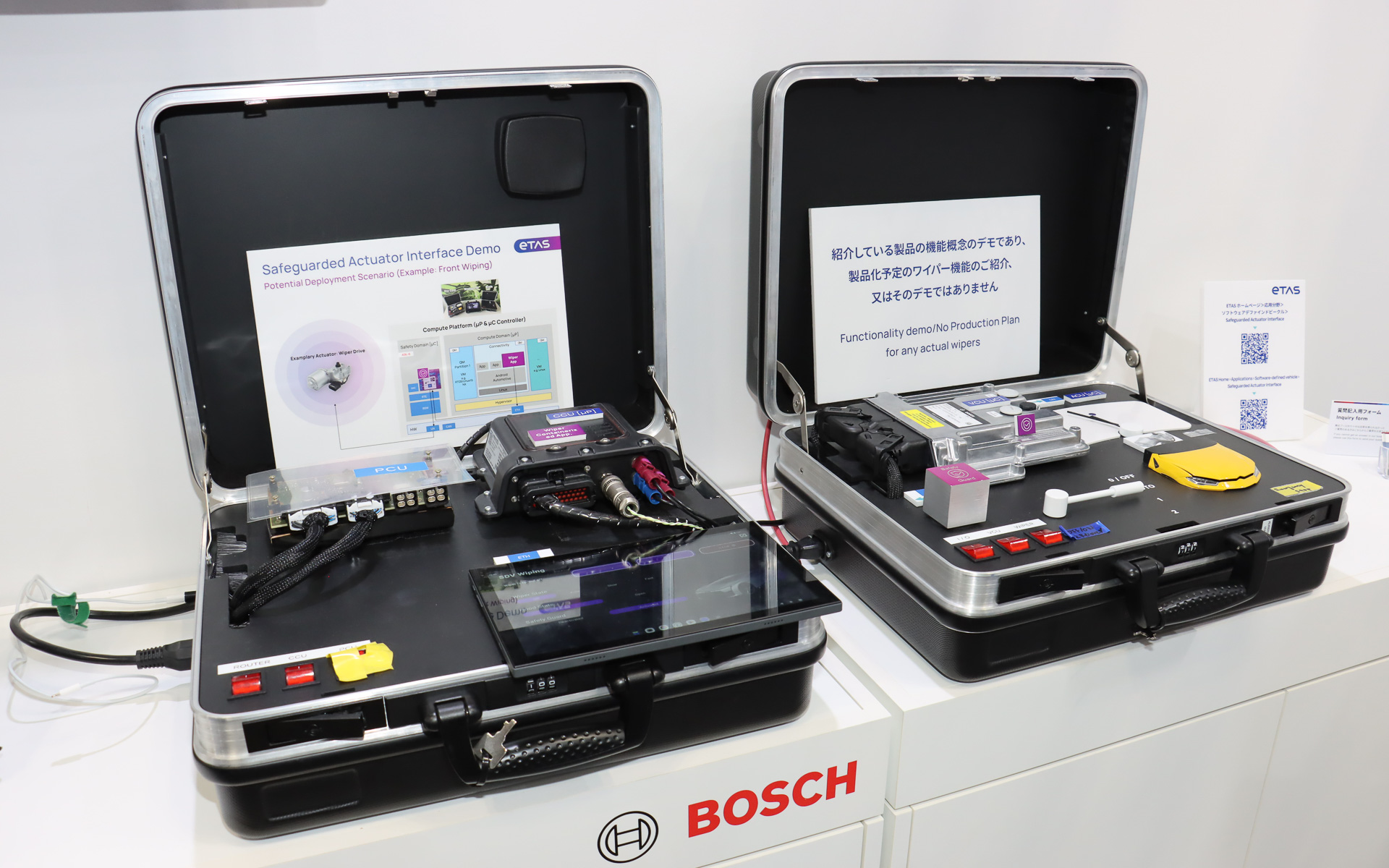 ワイパー制御を行なう従来型の制御ユニットとLinuxベースのプラットフォームの比較。システムに拡張性を持たせるためには「セーフティガード」を用意して安全性を確保する必要があるとした