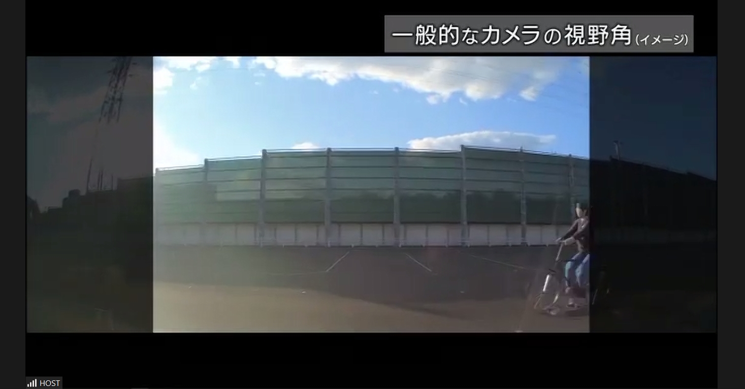 「直進時に駐車車両の側面から走り出してきた自転車を検知して自動ブレーキが作動するシーン」