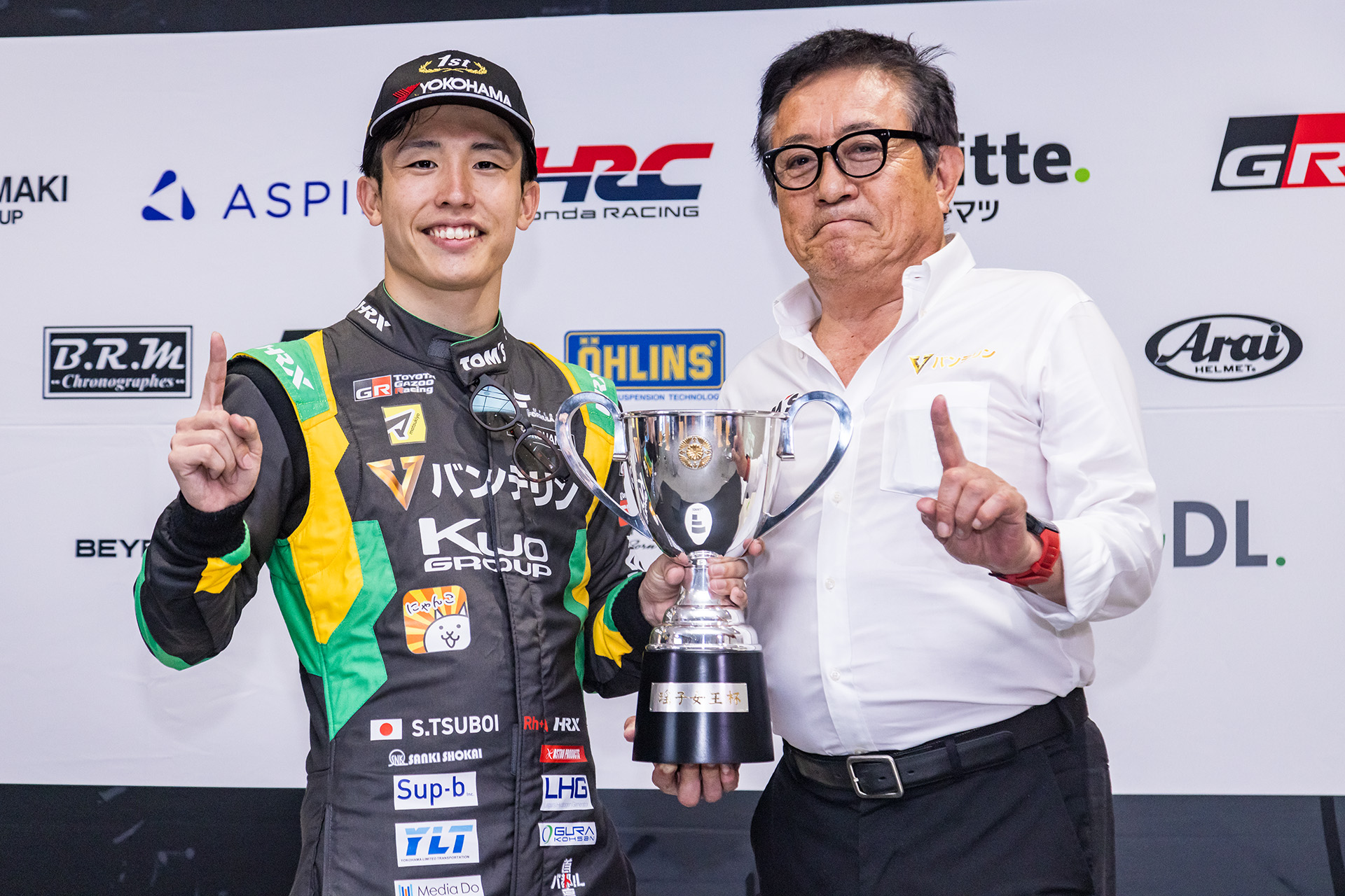 坪井選手と館監督