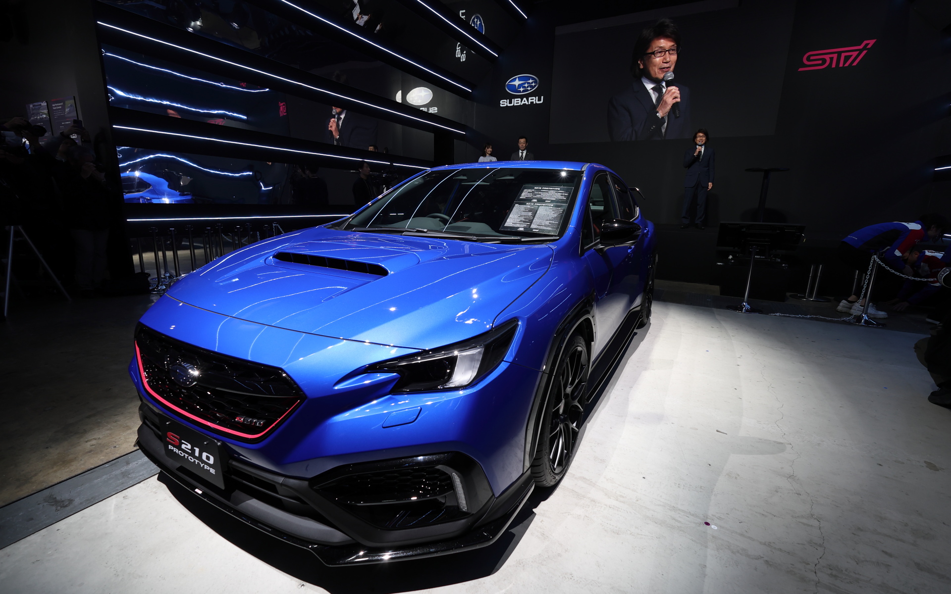 スバルテクニカインターナショナル株式会社 開発副本部長の高津益夫氏による「S210（プロトタイプ）」の発表