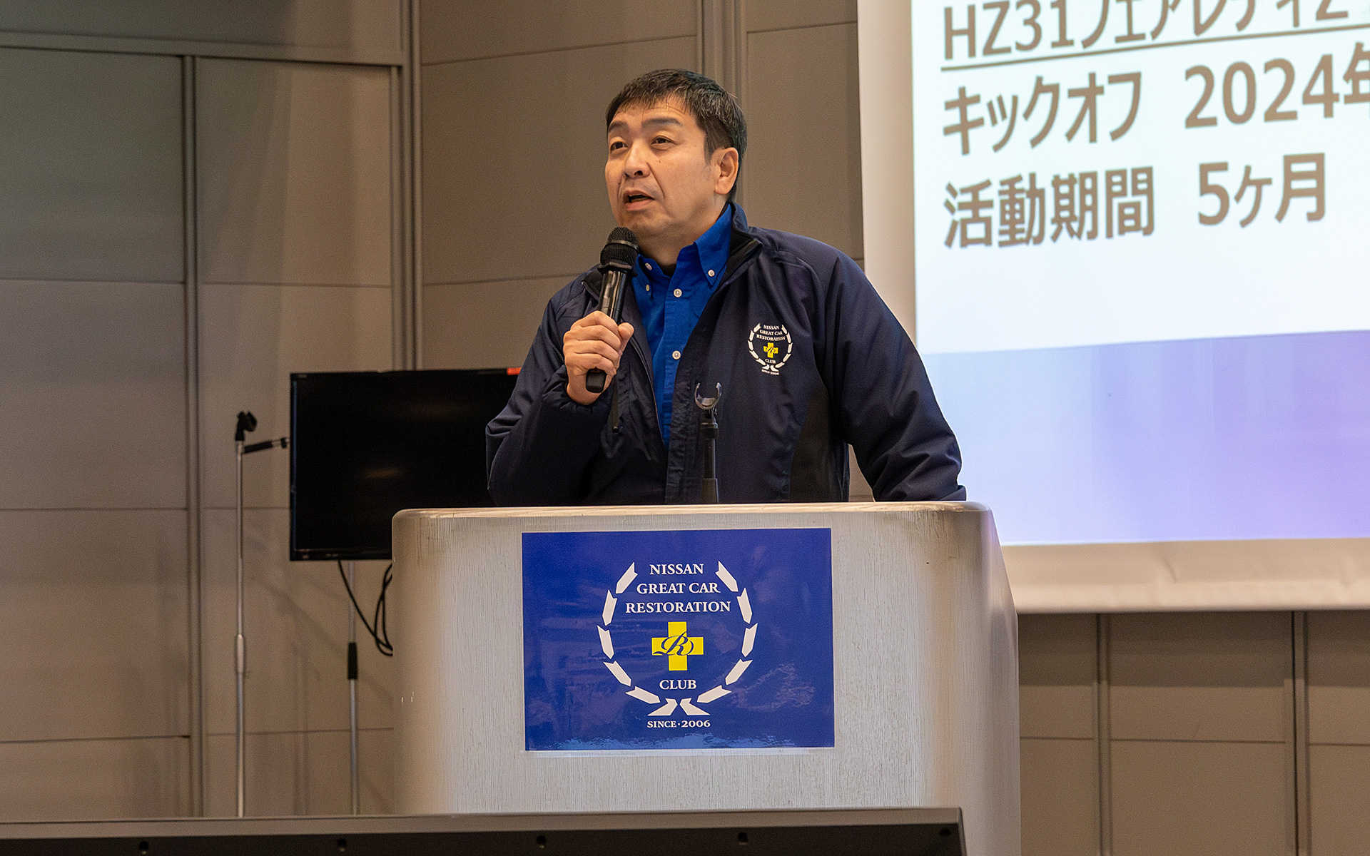 日産名車再生クラブの代表である木賀新一氏。日産自動車ではエンジニアとしてキャリアを重ね、現在は日産モータースポーツ＆カスタマイズに転籍し、SUPER GT GT500クラス日産系チーム総監督を務めている