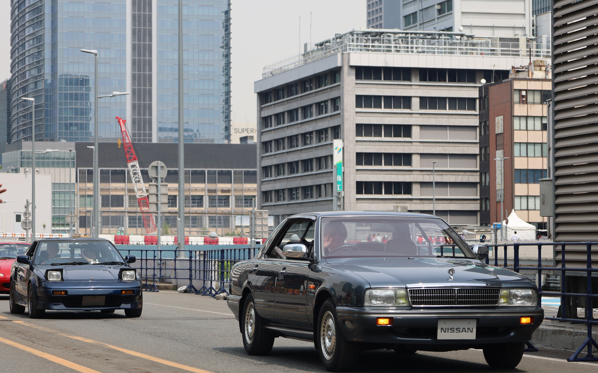 セレモニーには戦後の復興期から高度成長期の日本を象徴するクルマが登場した