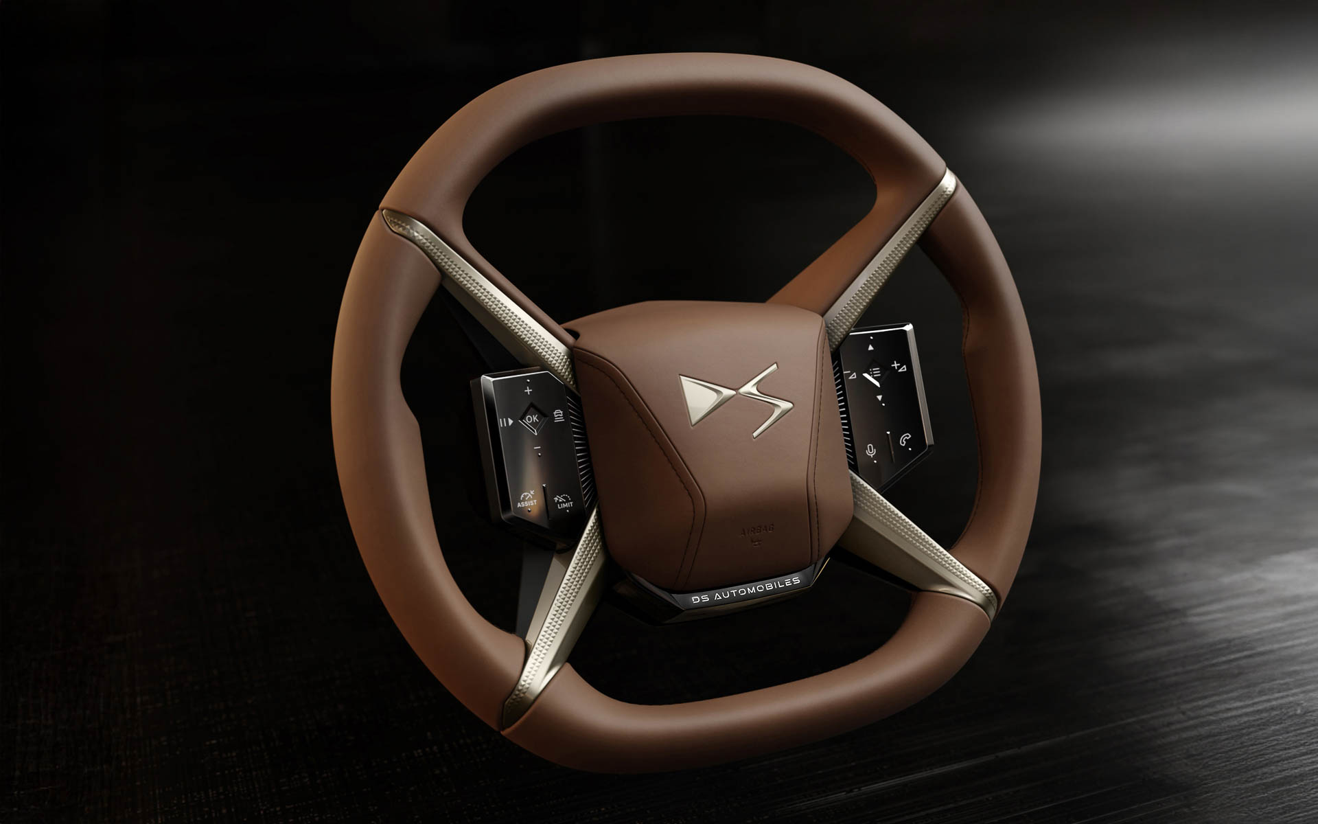 独特なX字型ステアリングホイールを装備