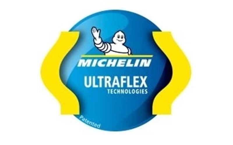 ウルトラフレックステクノロジーのロゴ。黄色の部分がタイヤの側面がたわんでも使用できることを表現している