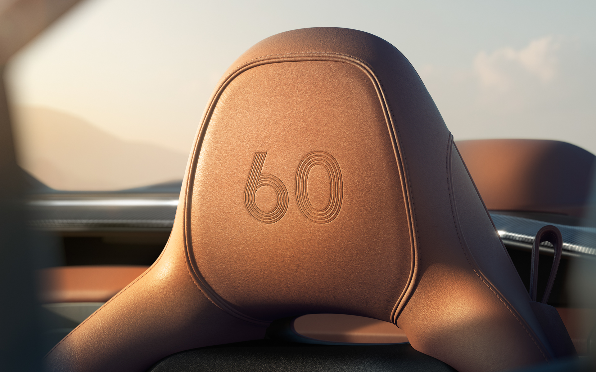 どちらのモデルもヘッドレストには60周年記念を表す刺繍が入る