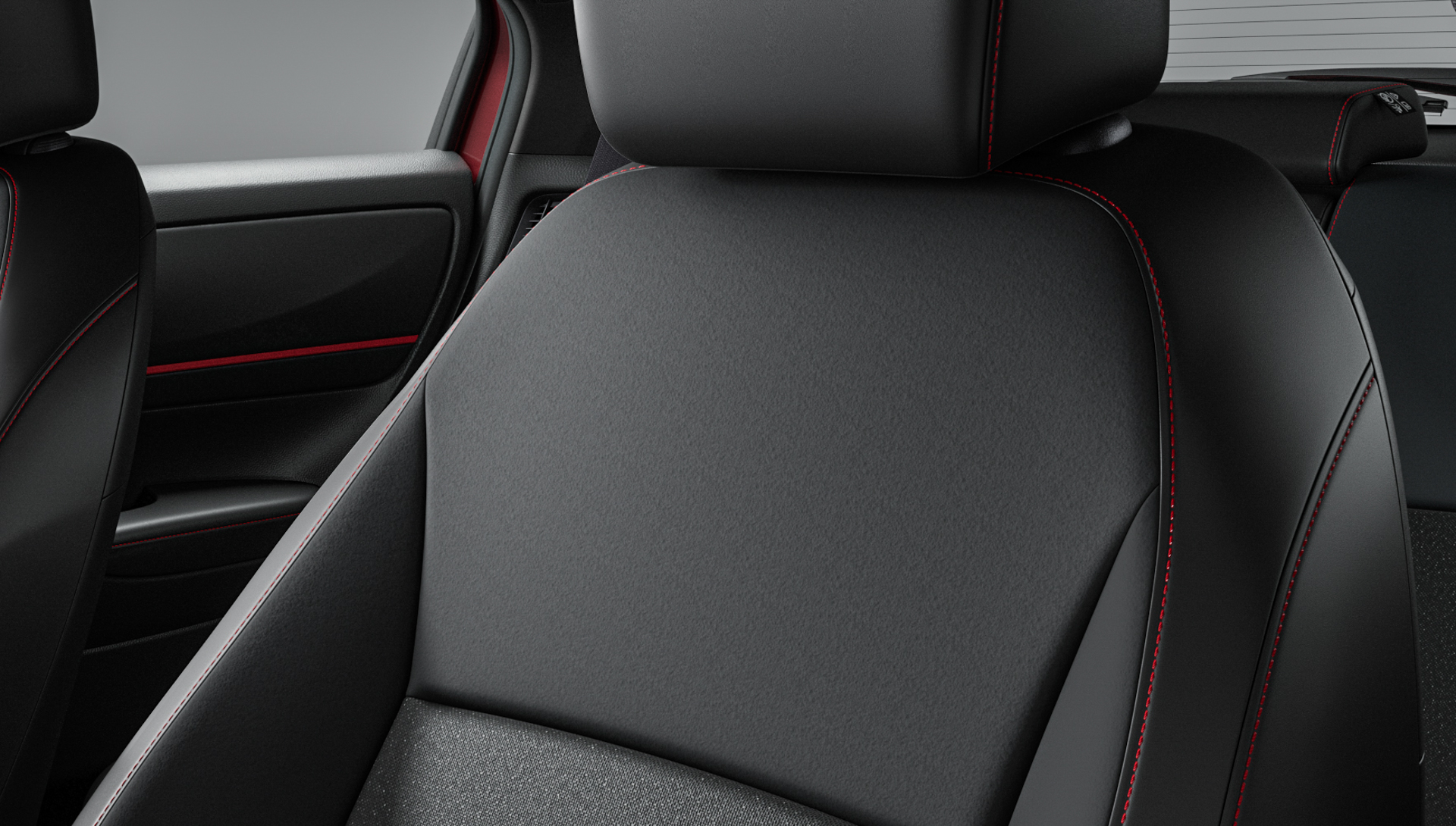 インテリアは黒を基調に、赤のアクセントを随所に配したほか、ラックス スェードを使用した専用のコンビシートを採用