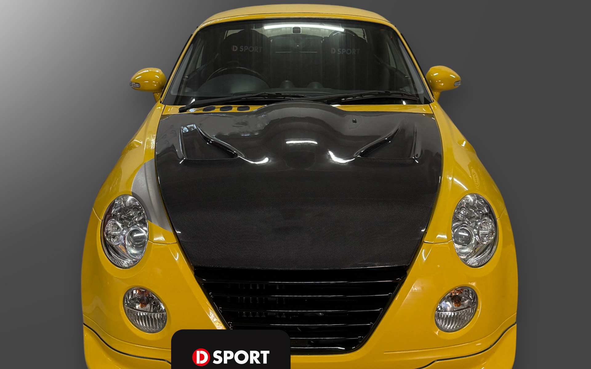 D-SPORTがダイハツ・コペン（L880K）用「カーボンボンネット」と「フロントグリル」を発売した