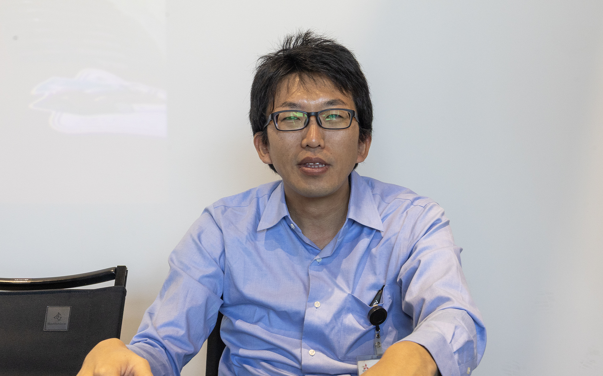 デリカベースの担当者である三菱自動車の小倉暁氏。コンセプトストア開催中は小倉氏がいろいろと対応してくれる