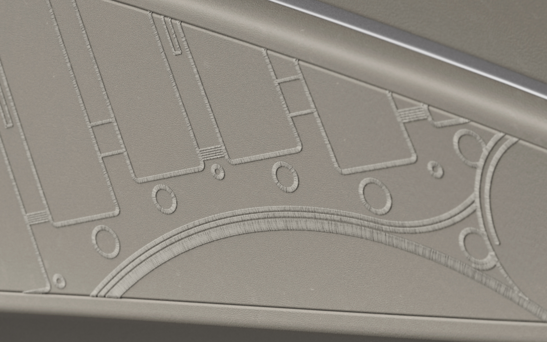 ドア内張にもMTCの設計図面から俯瞰図の一部を切り取ったデザインがあしらわれている