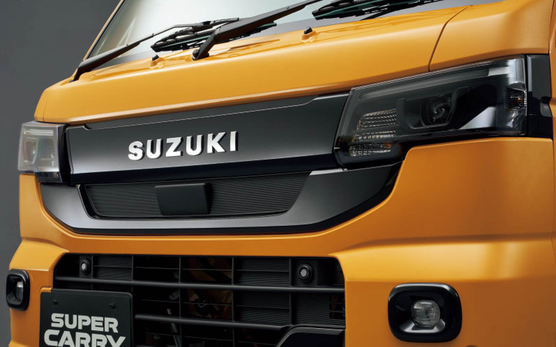 スーパーキャリイ Xリミテッド SUZUKIロゴ入り専用フロントガーニッシュ（ブラック）