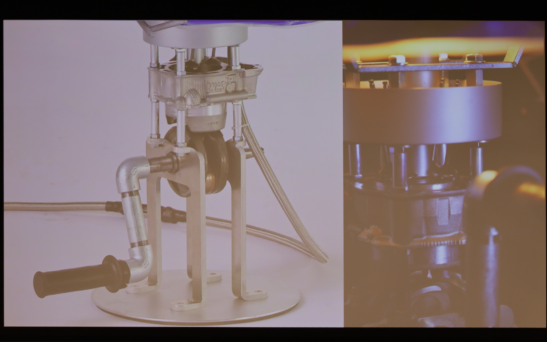 ただ照らすだけではない、ヤマハ発動機のエンジンの機能美に触れて学べる照明。8mm厚のアルミ一体成形で作られた土台には、本物の4ストロークエンジンの機構を搭載。ハンドルを手で回すとギヤが噛み合い、ピストンが往復。実際のエンジン同様、圧縮・爆発のタイミングに合わせてLEDが点灯するギミックを組み込んだ。光を拡散するシェード部分には、塗装工程で使われた「ハンガー（吊り具）」を骨組みにして、タンク用デカールの端材をパッチワークのように配置。廃材の隙間から漏れる不規則な光が、エンジンの鼓動をドラマチックに演出する