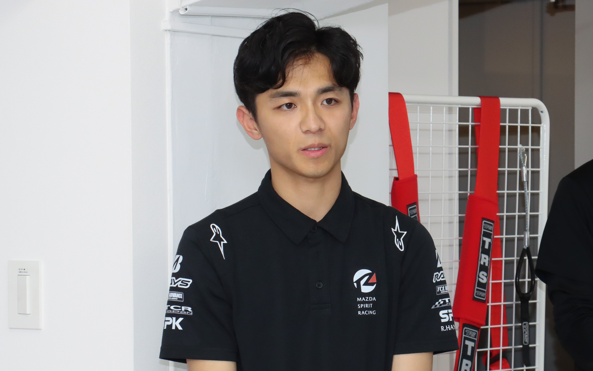 マツダ株式会社 ブランド体験推進本部 ブランド体験ビジネス企画部 林涼太氏は「MAZDA SPIRIT RACING」で行なっている取り組みやチャレンジプログラムなどについて解説