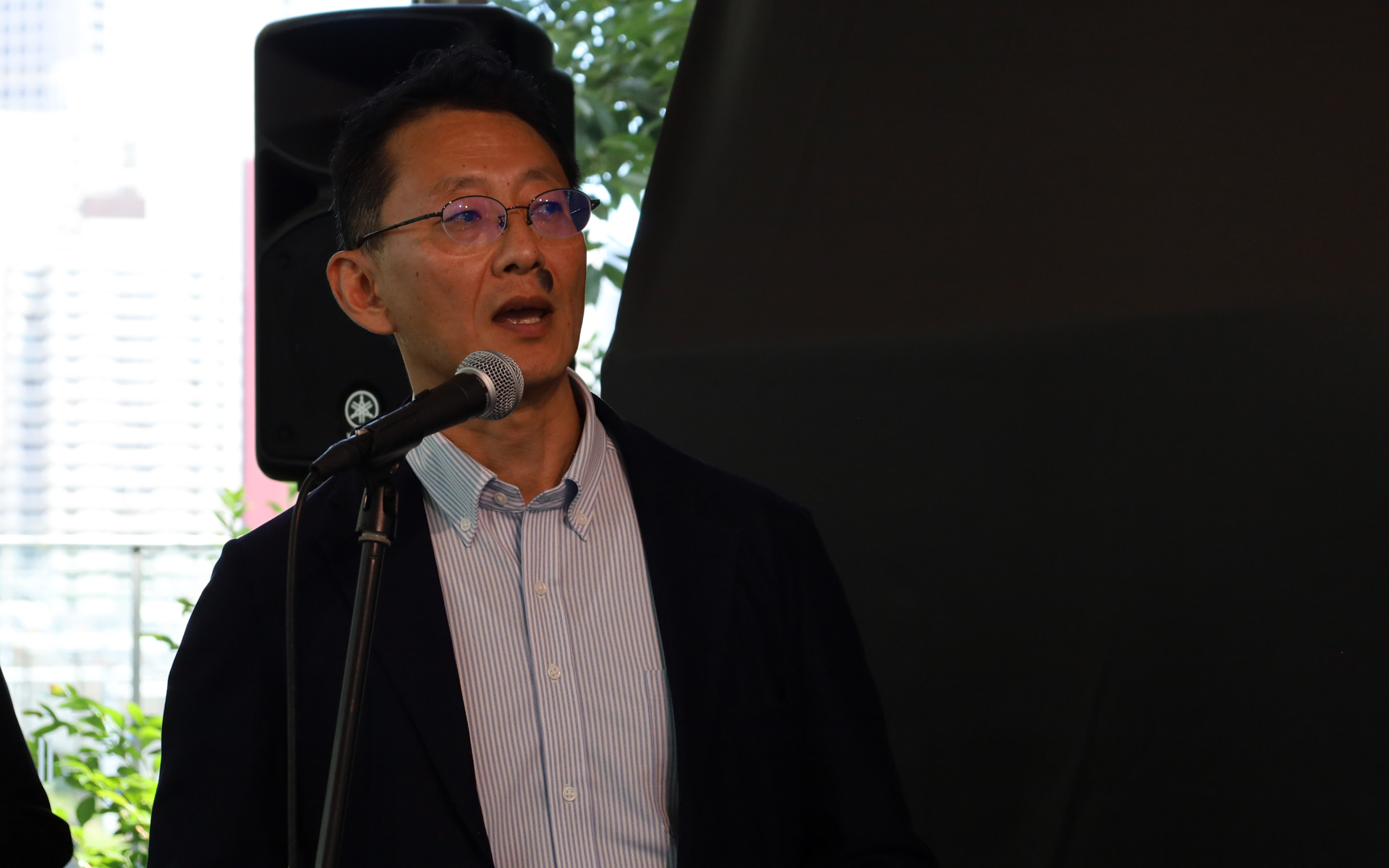 コシダテックの欧州営業部 部長の高原成明氏からは、コシダテックの概要とオートグローバルコシダの体制について、社長直下の「営業本部」の下に「管理部」「ブランドマネジメント部」「アフターサービス部」「ロジスティクス部」という体制で準備を進めていることが紹介された