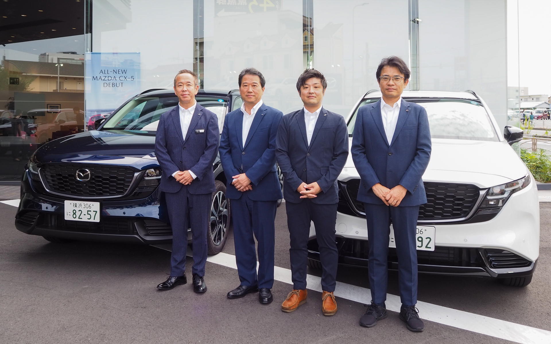 左から株式会社関東マツダMBA（マツダ・ブランド・アカデミー）推進グループ長 小西壮一氏、マツダ株式会社 理事 国内ブランドビジネス統括本部長 三浦忠氏、同 国内ブランドコミュニケーション部 主幹 竹下雅人氏、同 国内事業戦略企画 部長 又平知也氏
