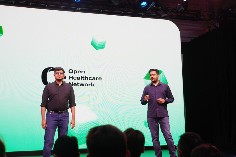 Open Healthcare Networkの、Head of Digital Public GoodsのBodhish Thomas氏と、Founding EngineerのGigin Chandy George氏