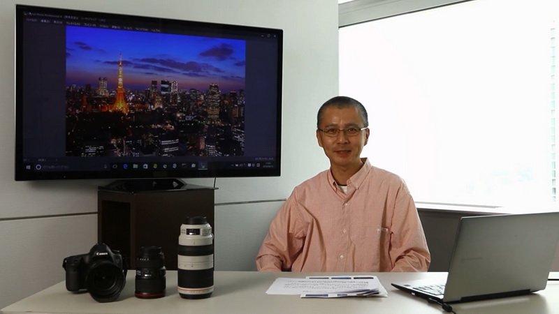 動画コンテンツのイメージ。夜景写真撮影講座の講師を務める川北茂貴さん。