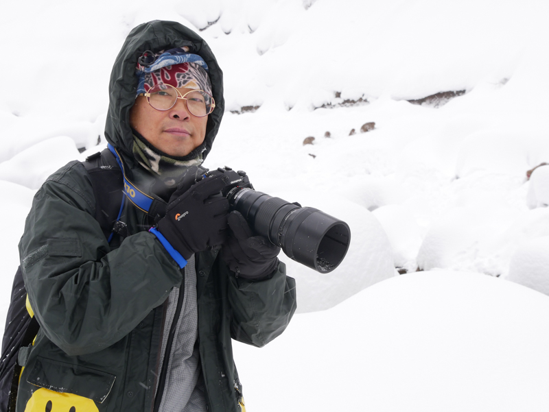 地獄谷野猿公苑にて。雪の舞う中、防塵・防滴・耐寒仕様を信じて約6時間撮影。人間の方は耐寒仕様でないので完全防備。