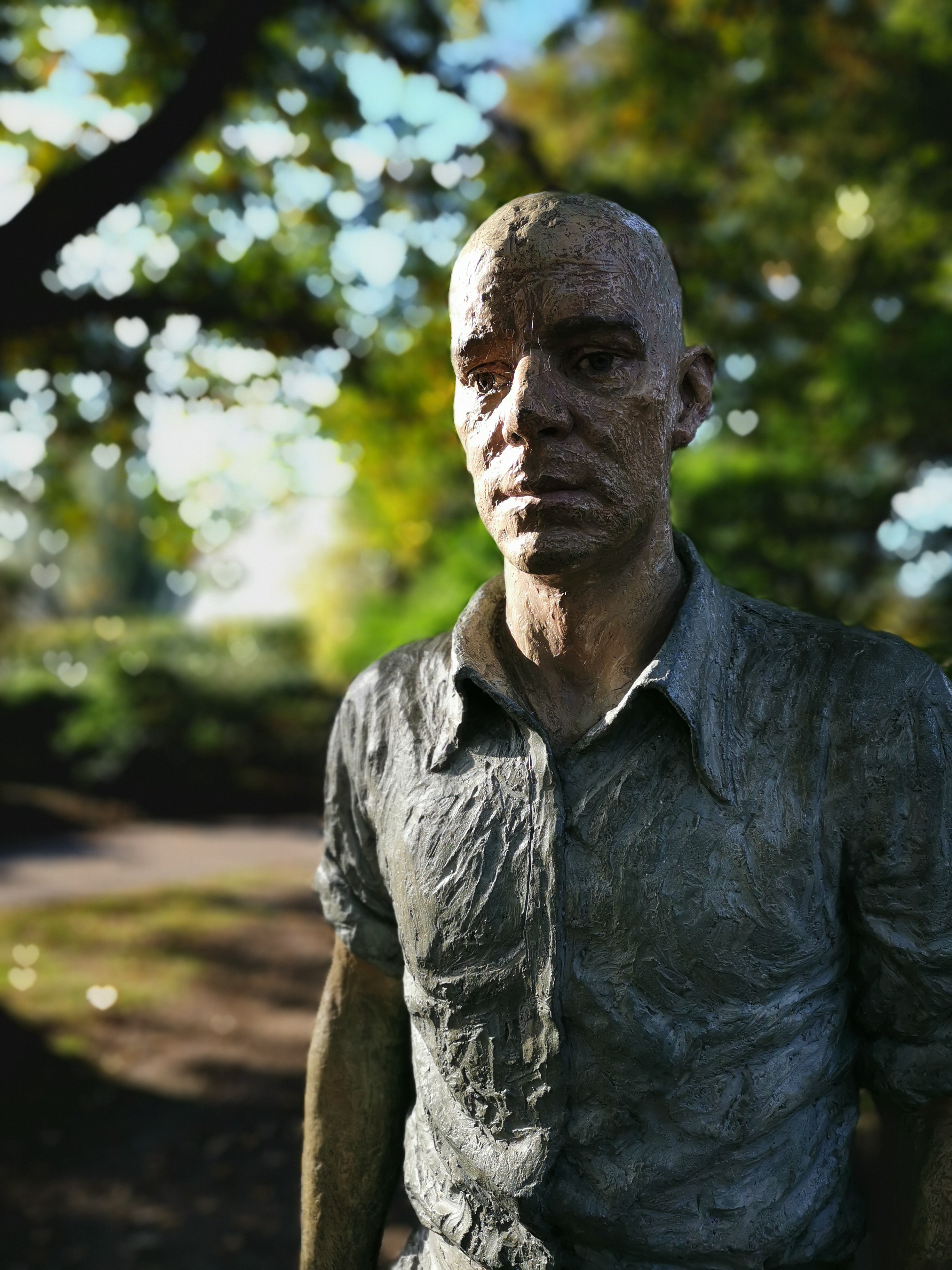 ポートレートモードでの背景のコントロール機能。ボケの点光源をハート型にした。