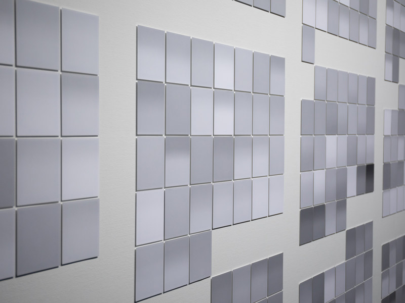 その日発表された大気汚染指標の最高値と最低値を露出値に変換している