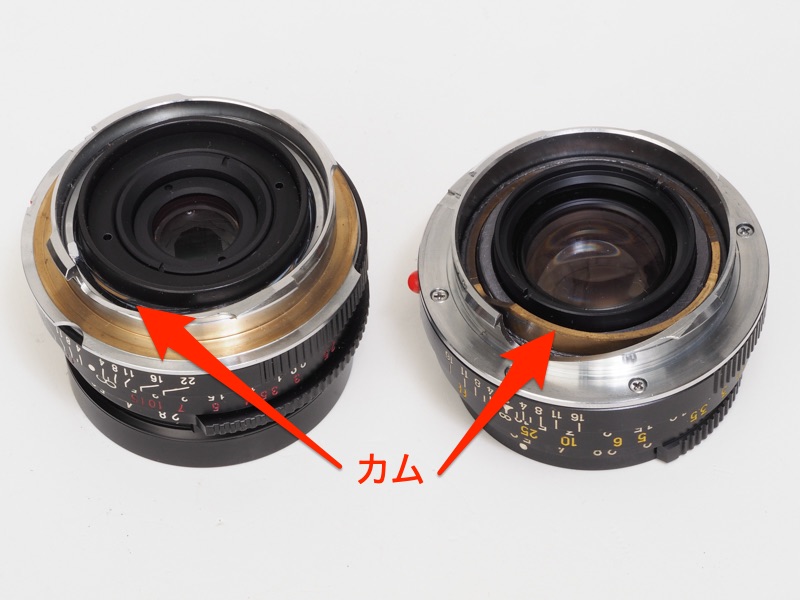 ゾナー40mm F2.8（左。L-Mリング付き）とMロッコール40mm F2（右）のカムを見比べました。Mロッコールはカムの距離計コロに当たる面が思い切り傾斜していることがわかると思います。