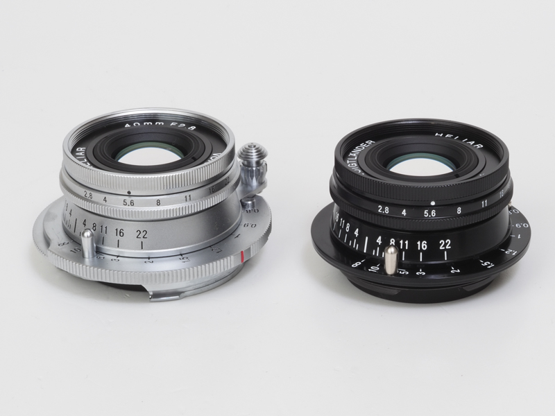 HELIAR 40mm F2.8 Aspherical。ライカMマウント用（VM）のシルバーと、ライカスクリューマウント用（L）のブラックペイント。ともに真鍮外装で、メッキの質感もペイントの厚みも良好。モノ的な価値が素晴らしいのです。