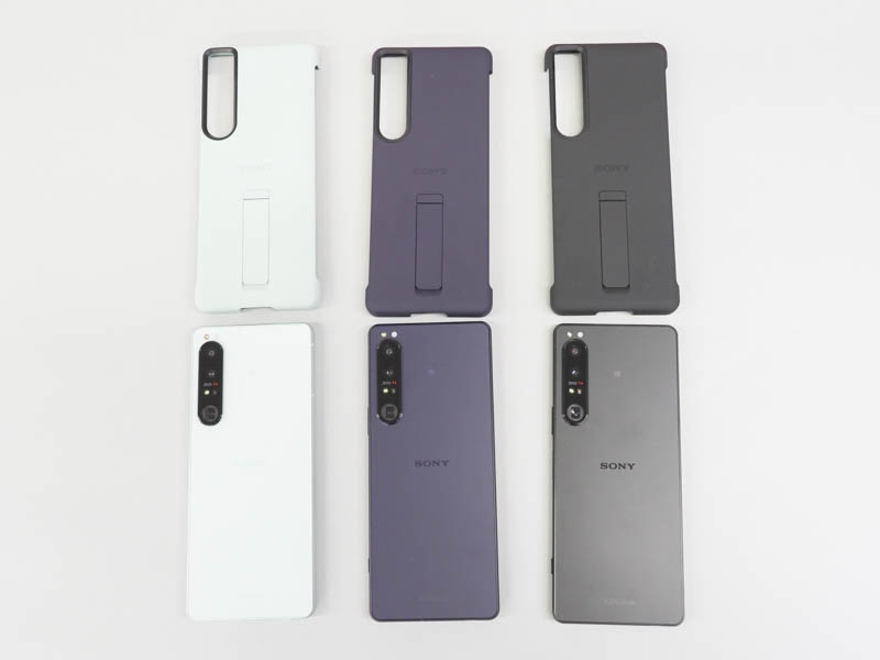 カラーバリエーション。左からアイスホワイト、パープル、ブラック。上部はスタンド付きの専用ケース（別売）