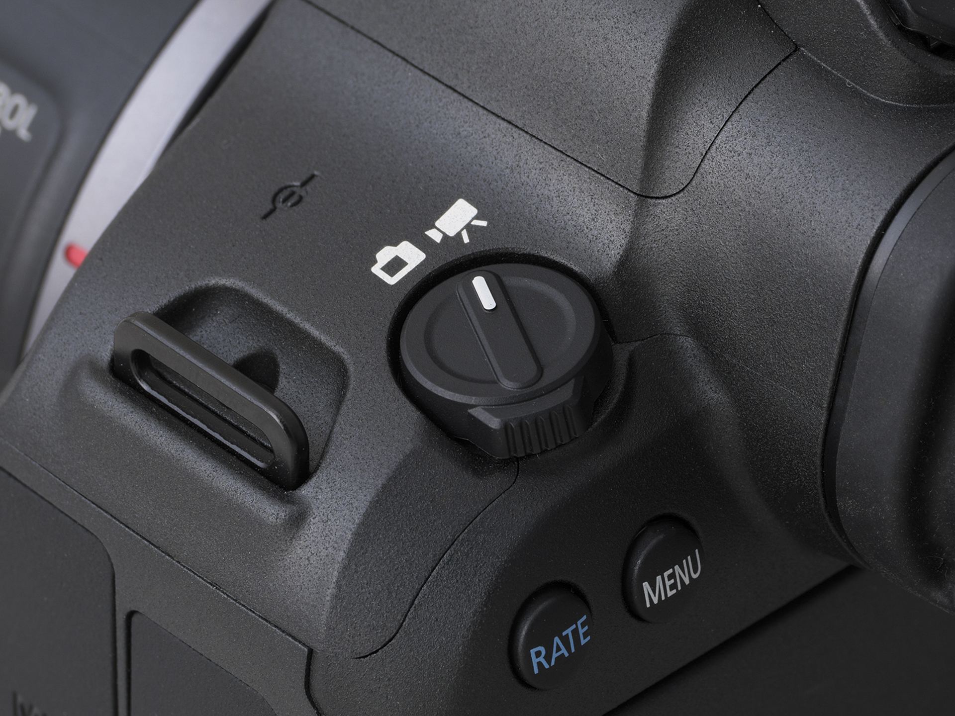 左手側上部にあるのが静止画撮影／動画撮影切り換えスイッチ