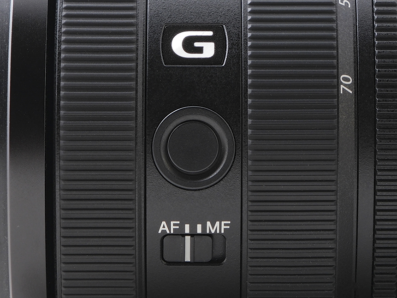 鏡筒左側のフォーカスホールドボタン