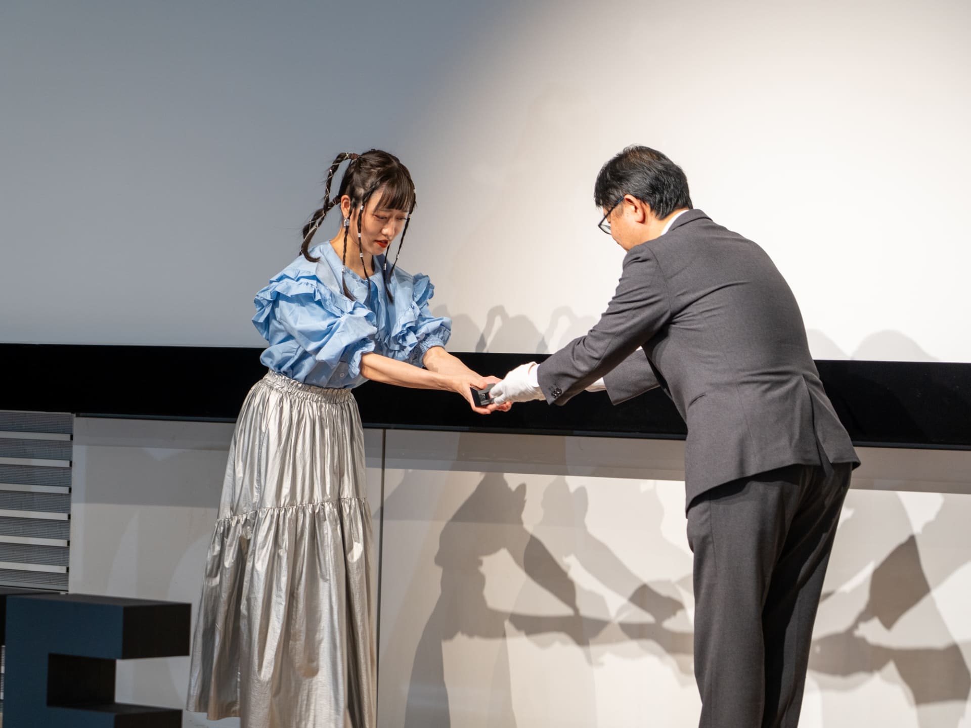 プレゼンターはキヤノンマーケティングジャパン株式会社カメラ統括本部長の吉田雅彦氏