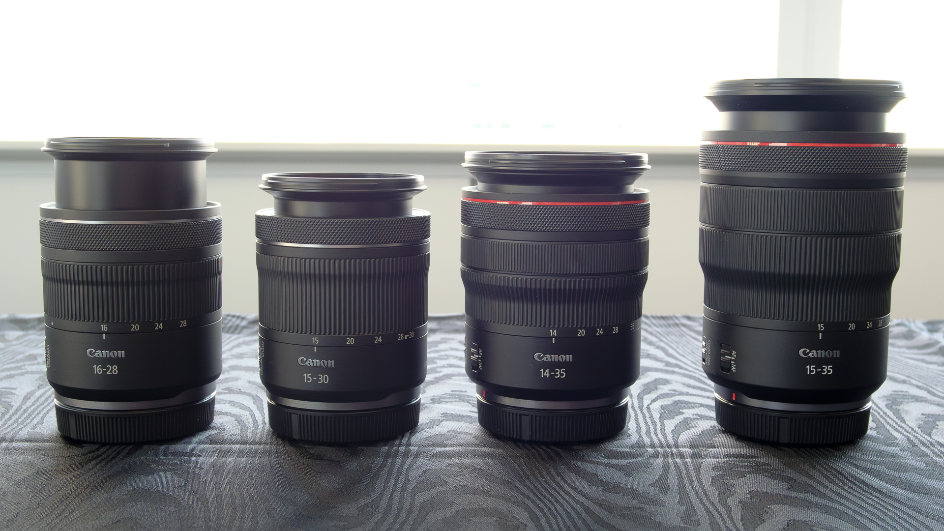 左から「RF16-28mm F2.8 IS STM」「RF15-30mm F4.5-6.3 IS STM」「RF14-35mm F4 L IS USM」「RF15-35mm F2.8 L IS USM」