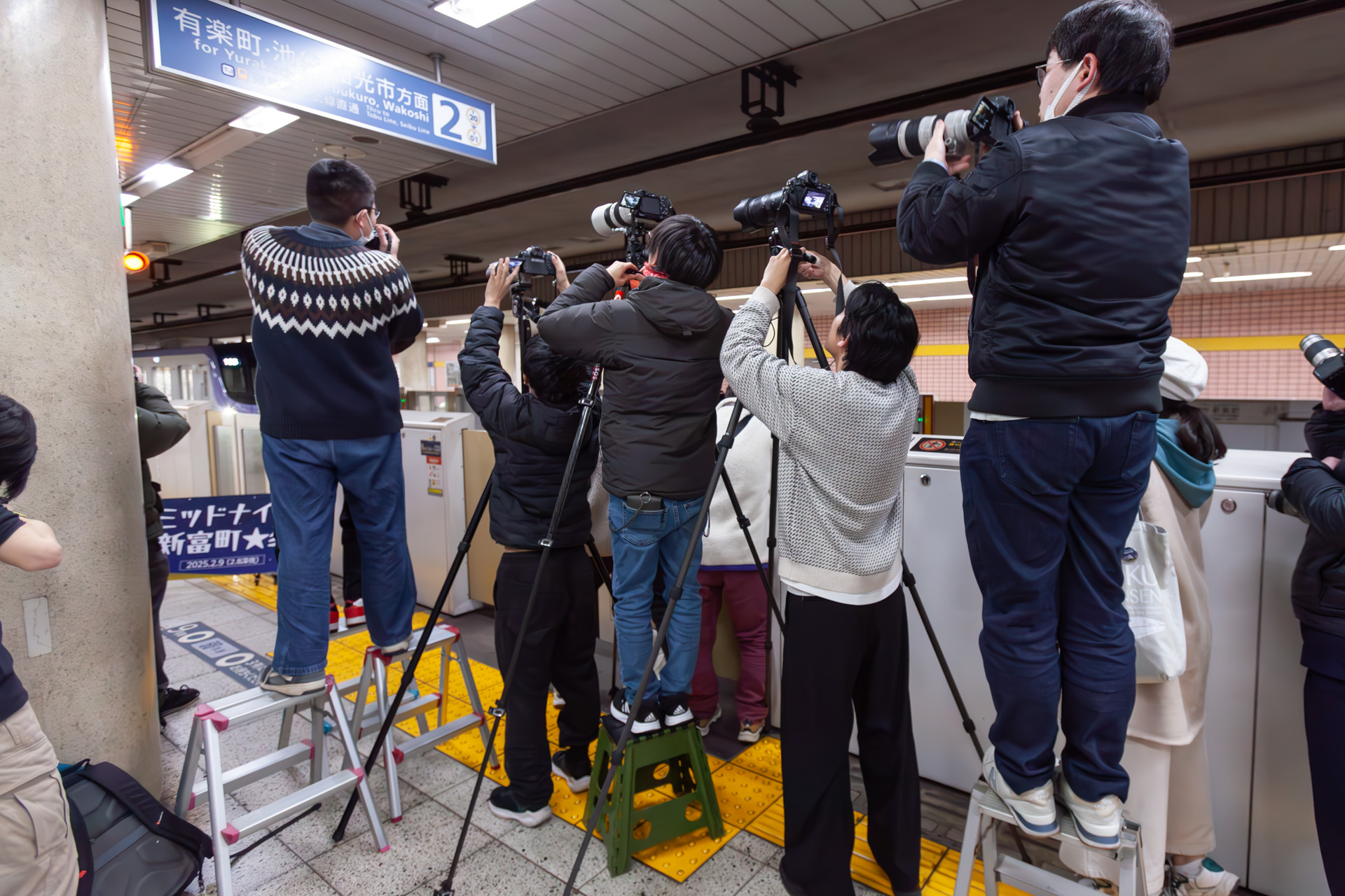 超望遠レンズで狙う参加者