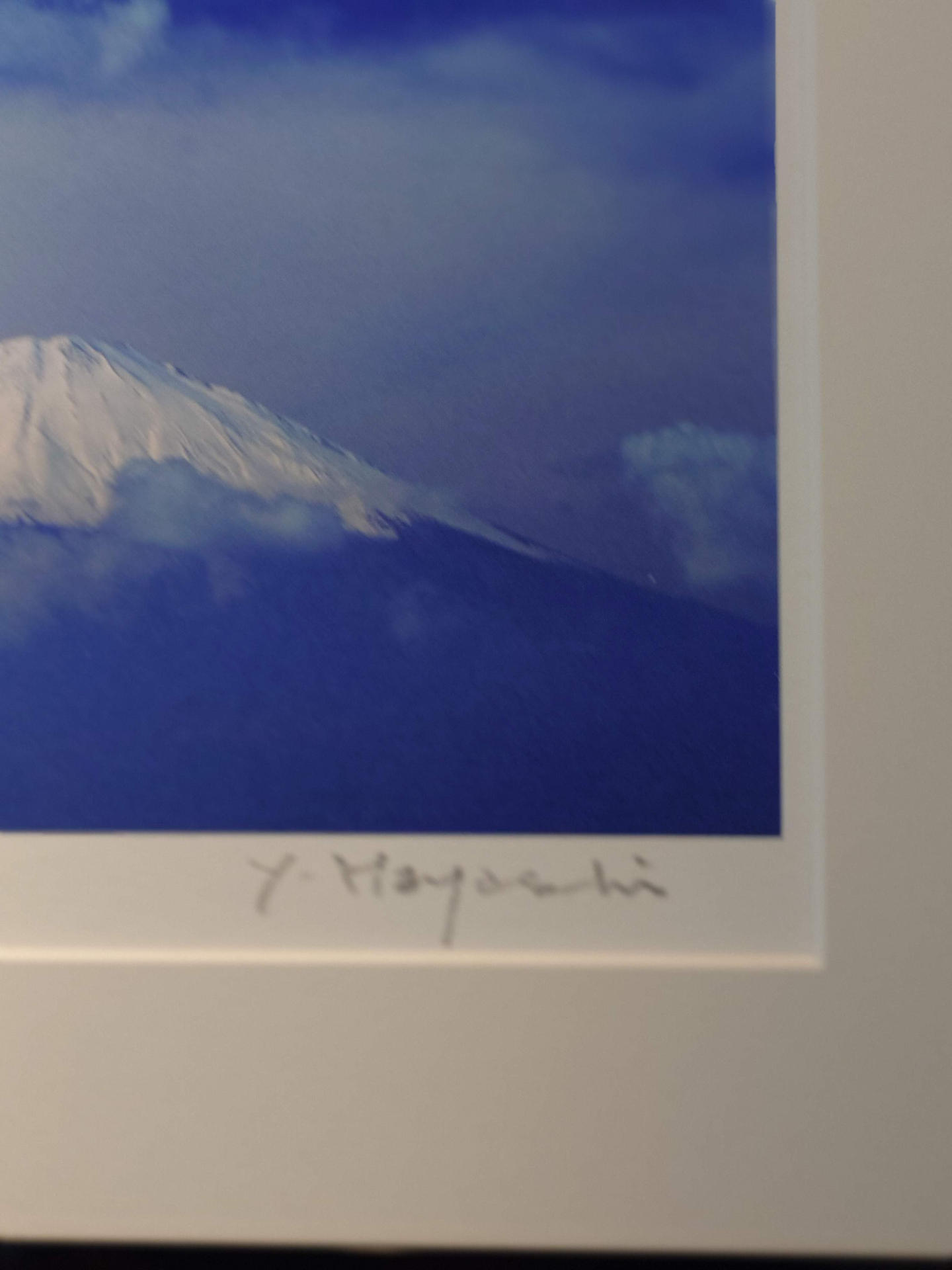 林さんの写真の一部とサイン