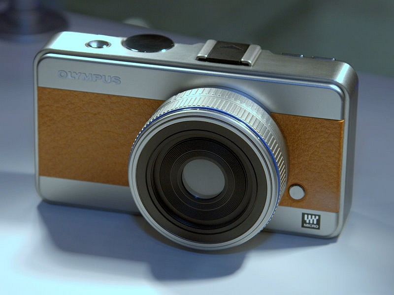 <b>オリンパスが展示していたプロトタイプ。これはマイクロフォーサーズ機のデザイン候補のうちの1つだったらしい</b>