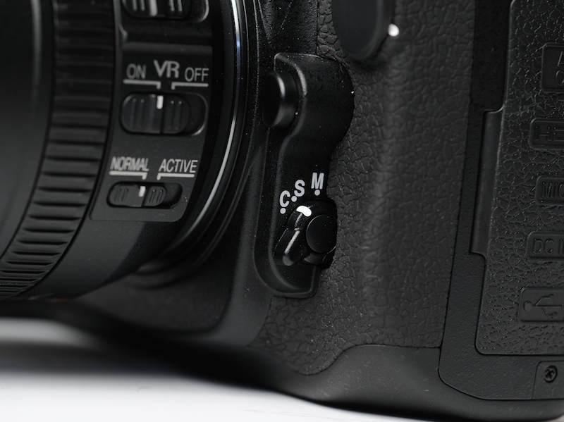 <b>AF切替操作ボタン、またはスイッチ</b>