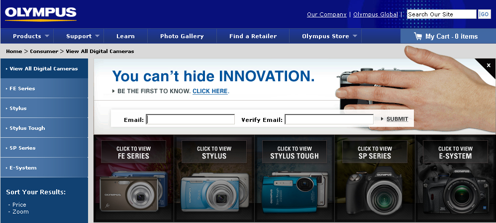 <b>オリンパスアメリカに掲出された新型カメラと思われる製品のティーザー広告</b>