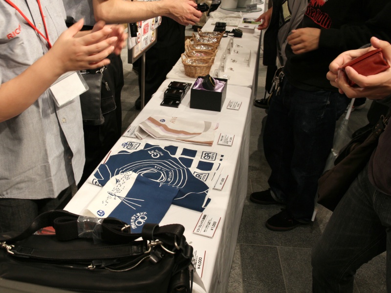 <b>リコーもRING CUBEで販売しているグッズを用意</b>
